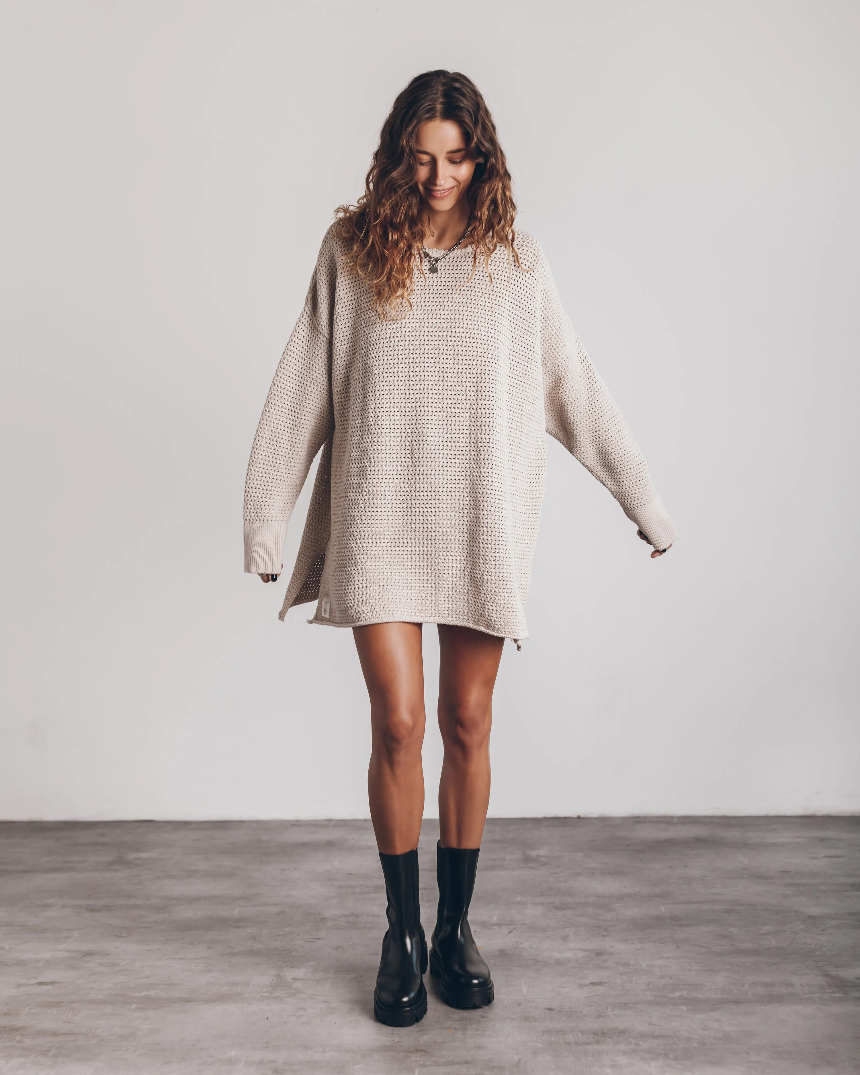 Sure! How about Cozy and Stylish Light Long Knitted Sweater?